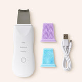 DermaGlow Pro con sus cabezales de silicona y cable USB
